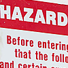 Health and Safety student writing on hazard board