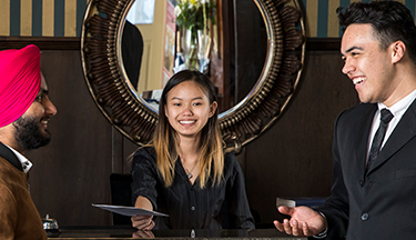 Tourism graduates on the job