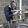 Student doing engineering fabrication