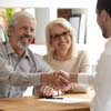 Real Estate salesperson with clients