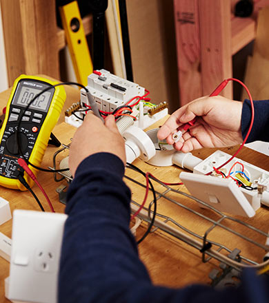 Electrical student working on a circuit
