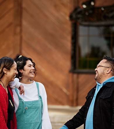 Students talking outside of Tangatarua Marae