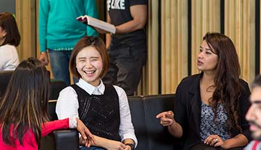 English Language students talking amongst each other