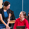 Student asking tutor a question during class