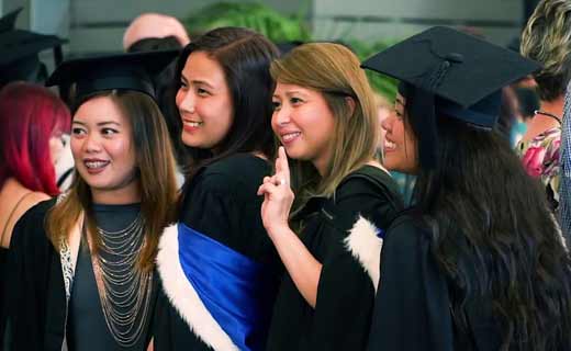 Graduates posing for a photo
