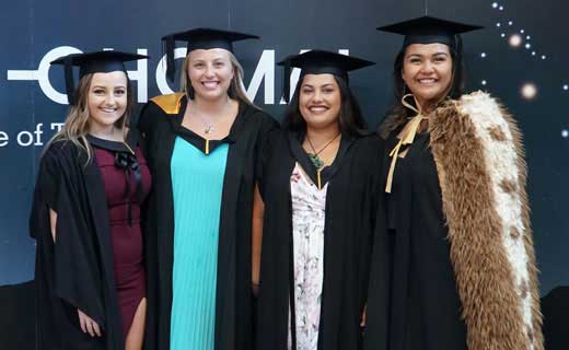 Graduates posing for a photo