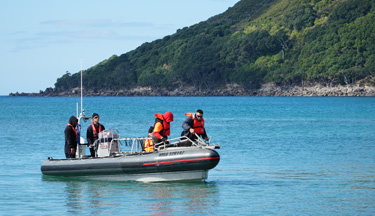 Maritime students out on a boat in the harbour 