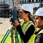 Students using a theodolite Surveying image