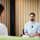 Social worker talking to their client Social Work image