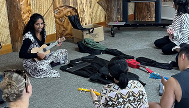 Chedly Fernando playing ukelele