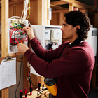Electrical student working on a circuit Electrical student working on a circuit