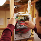 Electrical student working on a circuit Electrical student working on a circuit