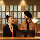 Hospitality Management student with a client
