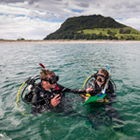 Marine students in the water with their dive gear