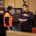 Engineering student talking with tutor