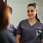 Nursing student interacting with a patient