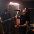 Music students performing in studio