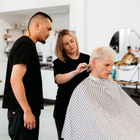 Toi Ohomai tutor demonstrating to student how to cut hair