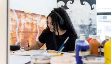 Creative student working on their art