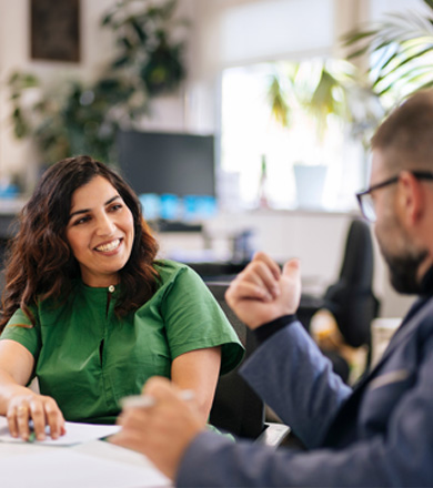 Postgraduate student talking with their tutor