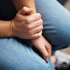 Patient sitting on the floor