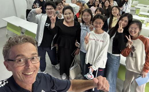 Gordon Oakley with students in China