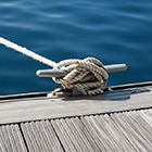 Rope tied up to boat mooring