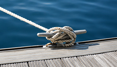 Rope tied up to boat mooring