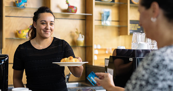 Campus café staff serving food
