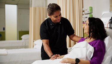Student assisting their patient