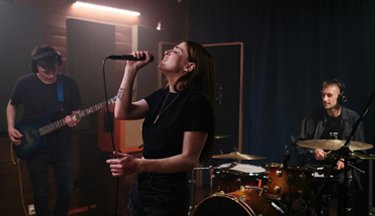 Music students performing in studio