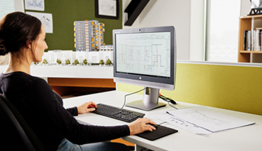 CAD student working on the computer