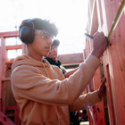 Construction student marking out a measurement