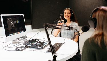Content creation students in the podcasting studio