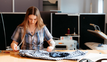 Fashion student working on their garment
