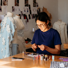Fashion student working on their garment