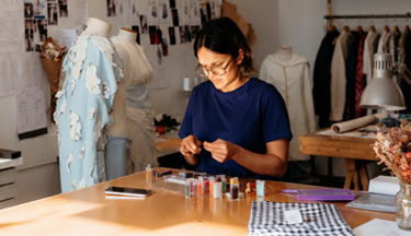 Fashion student working on their garment