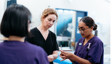 Nursing students with their tutor