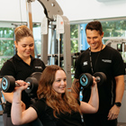 Sport students in the gym with their tutor