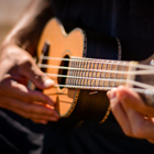 Student playing the ukelele