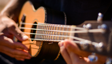 Student playing the ukelele