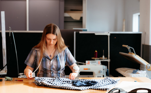 Fashion student working on their garment