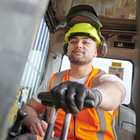 Forestry student operating machinery
