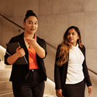 Hotel manager showing student around