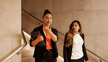 Hotel manager showing student around