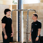Student with tutor talking to each other about an exercise