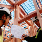 Student looking over building plans
