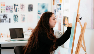 Creative student working on their artwork
