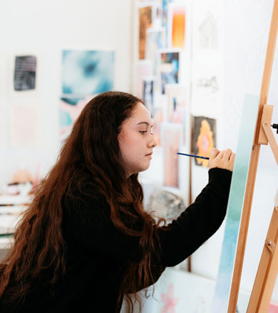 Creative student working on their artwork