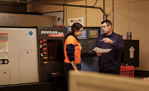 Manufacturing student with their tutor